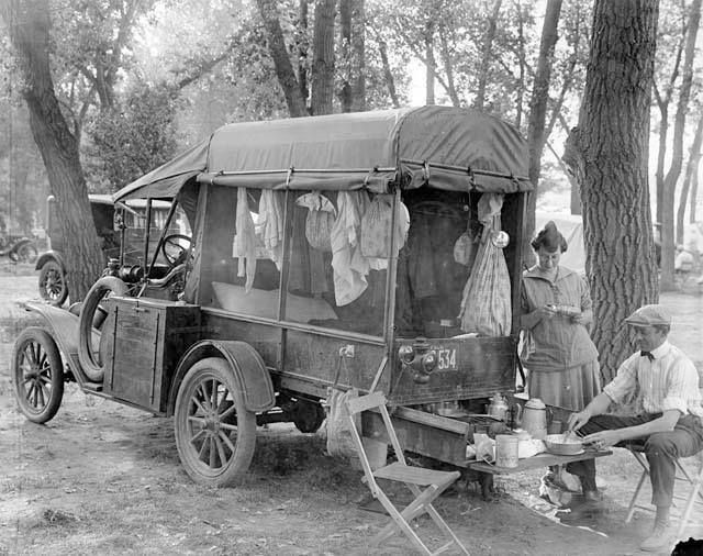 1918 Camper – Pull out picnic table and roll up curtains.