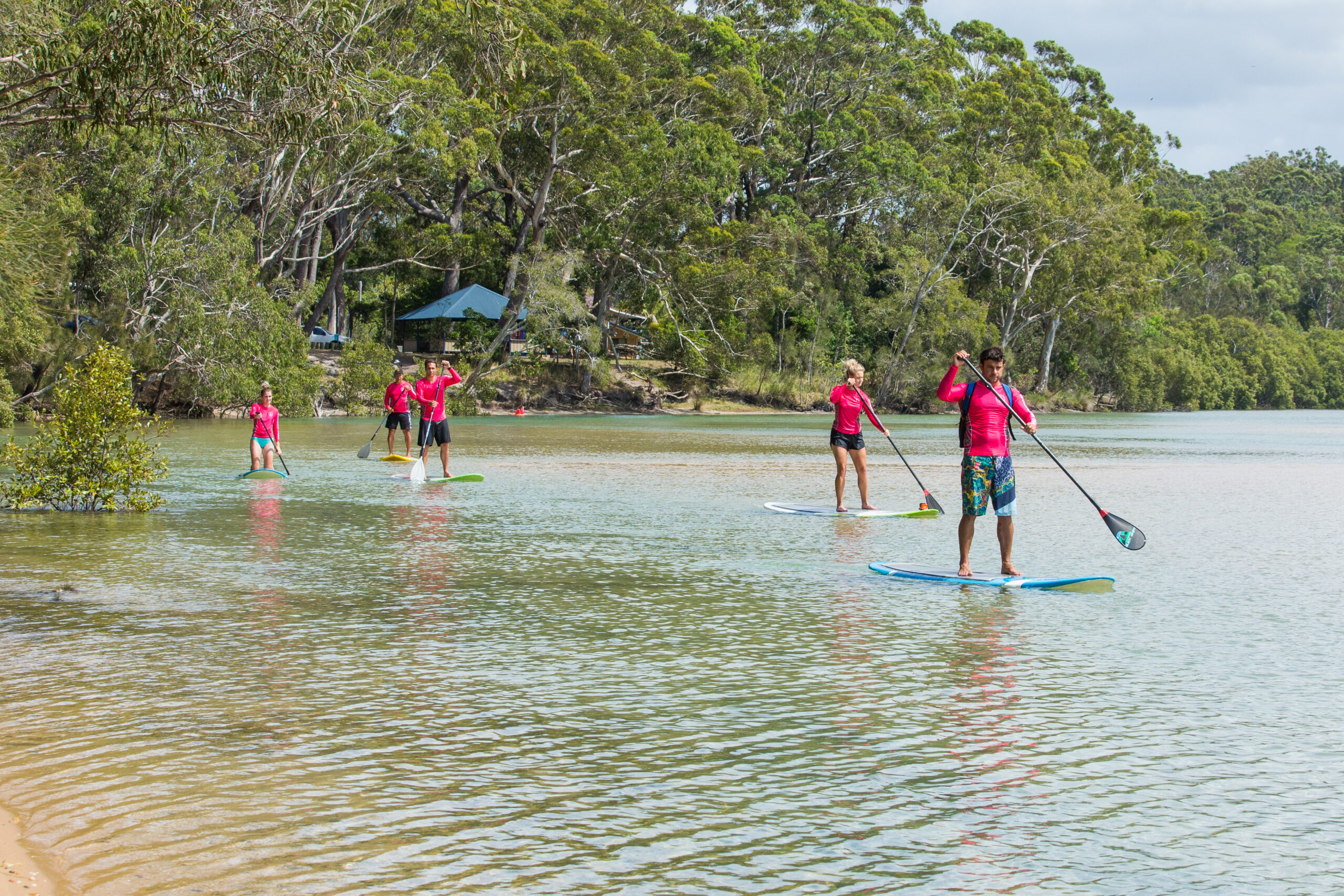Carly Booth, Olafia Kristinsdottir and Ky Hurst during a paddle boarding trip with Clark Webb and Shane Singleton of Wajaana Yaam